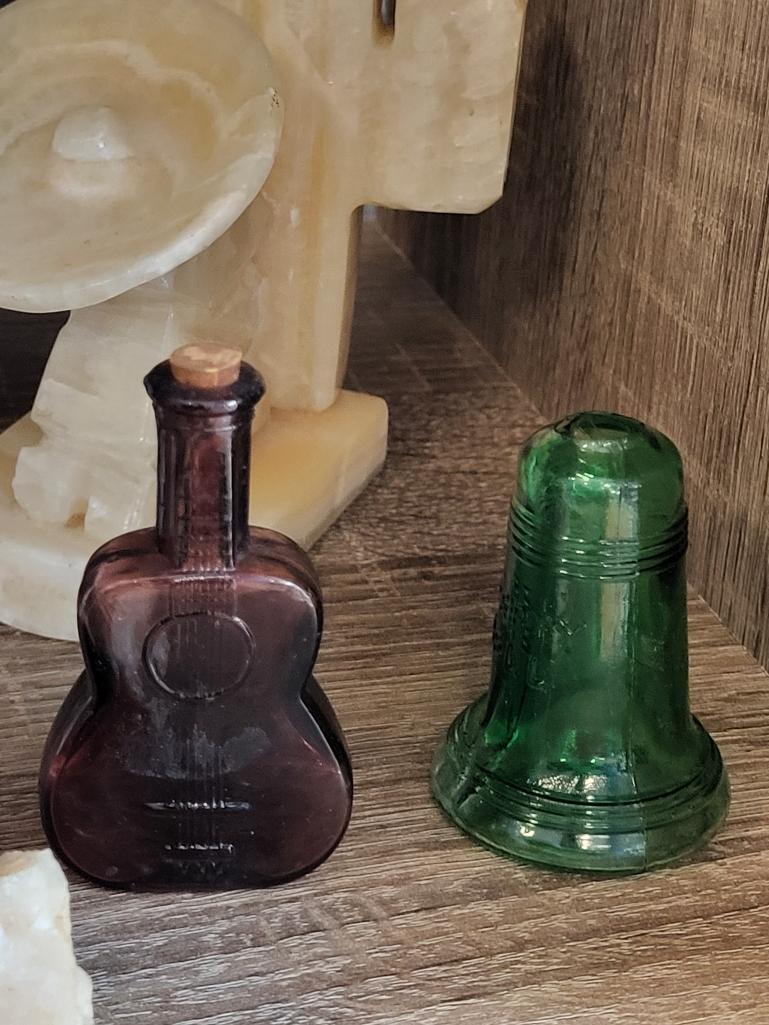 CARVED VINTAGE ONYX SLEEPING AMIGO AND CACTI BOOKENDS, MINI GLASS LIBERTY BELL, DECANTER AND VIOLIN.