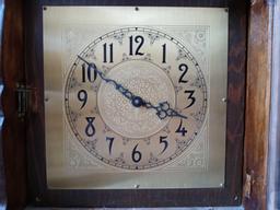 GERMAN GRANDMOTHER CLOCK, NEEDS MINOR WORK, MEASUREMENTS ARE APPROXIMATELY 14 1/2 IN X 10 IN X 70