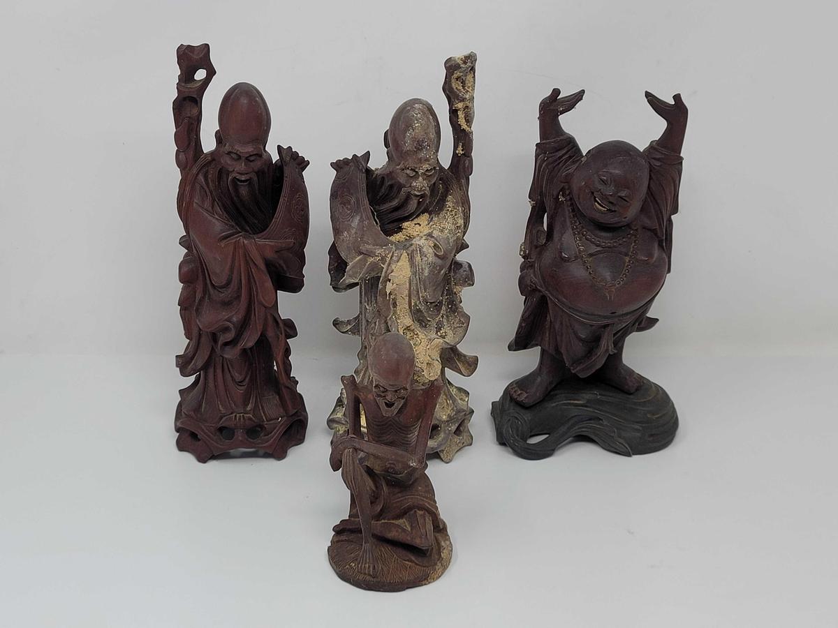 LOT OF 4 WOOD CARVED MAHOGANY ORIENTAL FIGURINES 1 IS 6 INCHES TALL AND 3 ARE 10 INCHES TALL