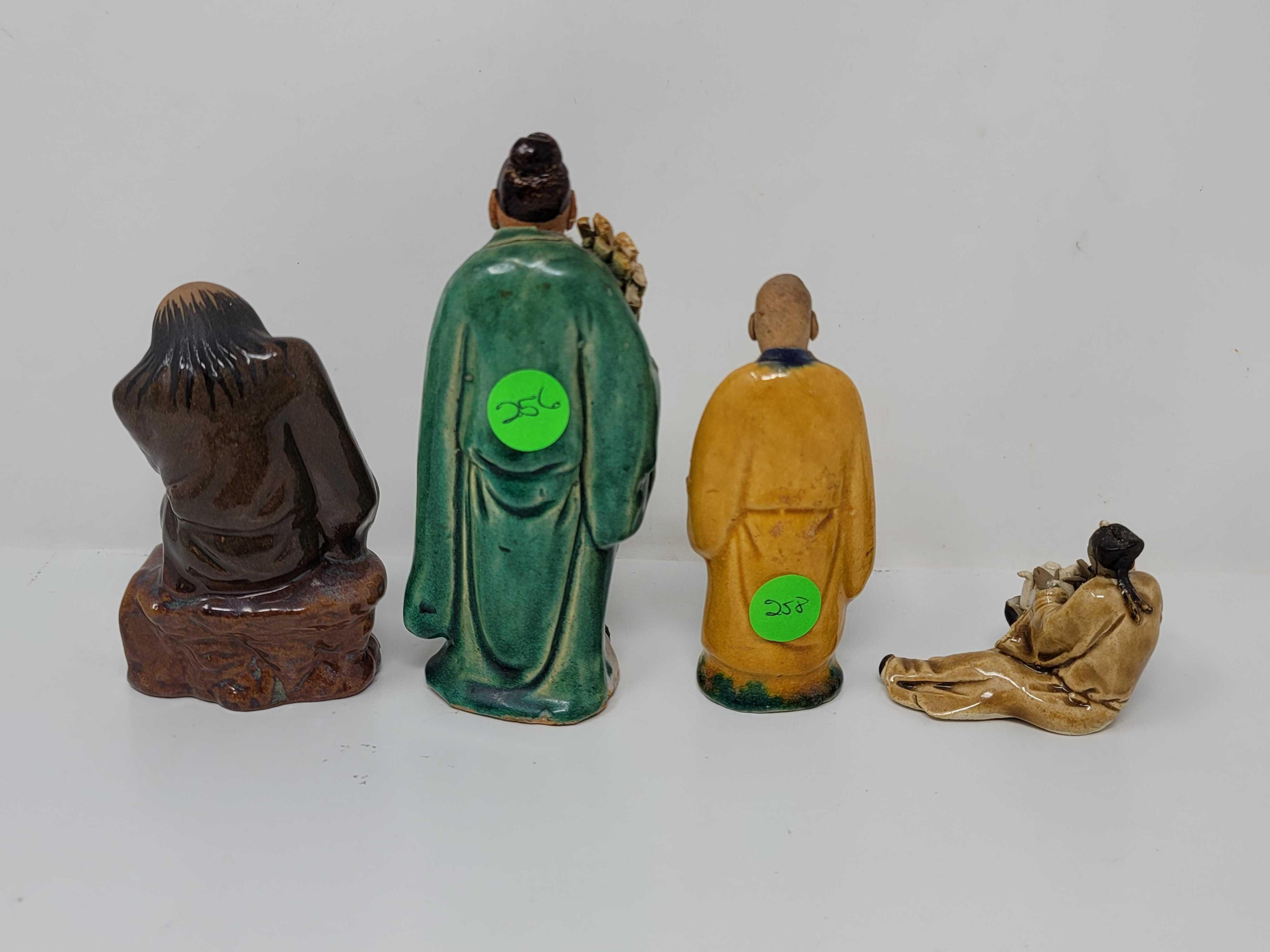 LOT OF 5 ORIENTAL MUDMEN, WATER CARRIER HAS SOME DAMAGE; MEASURES 8 INCHES TALL AND ONE THAT IS 2