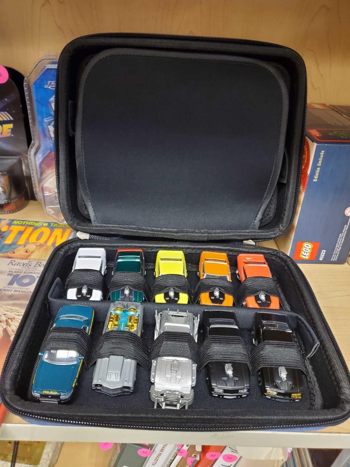 SOFT ZIP CASE FILLED WITH MISC DIECAST CAR MODELS, MUSCLE CARS, AND 1 POLICE CAR, PLEASE SEE THE
