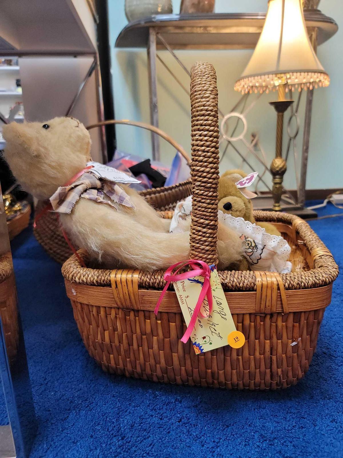 (RM1) LARGE WICKER BASKET WITH WRAPPED HANDLE AND SIDES. ALSO INCLUDES A HANDMADE SIGNED TEDDY BEAR,