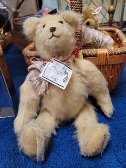 (RM1) LARGE WICKER BASKET WITH WRAPPED HANDLE AND SIDES. ALSO INCLUDES A HANDMADE SIGNED TEDDY BEAR,