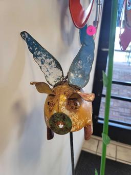 BENCHMADE METAL FLYING PIG YARD ORNAMENT. MEASURES APPROX 4" X 6" X 46.5"