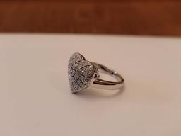 (DR) MARKED "925" STERLING SILVER HEART SHAPED RING, ACCENTED WITH SM. CZ CHIPS. IT WEIGHS APPROX.