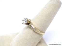 E.G.L. CERTIFIED 0.79 CT ROUND BRILLIANT CUT VVS2 DIAMOND MOUNTED IN 14 KT YELLOW GOLD RING. HAS