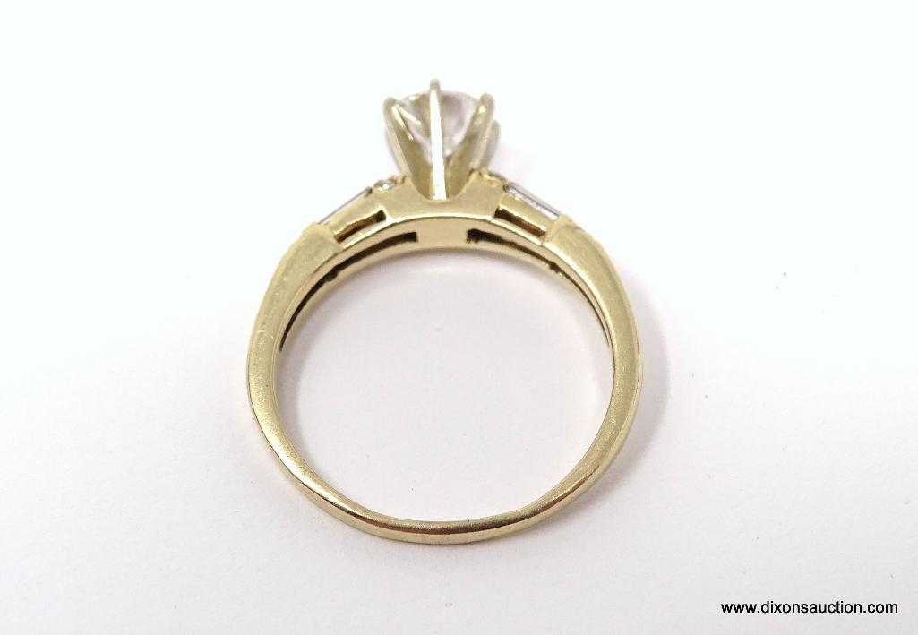 E.G.L. CERTIFIED 0.79 CT ROUND BRILLIANT CUT VVS2 DIAMOND MOUNTED IN 14 KT YELLOW GOLD RING. HAS