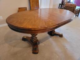 (DR) BERNHARDT BRAND WALNUT OVAL DINING ROOM TABLE ON TWO LARGE TABLE LEGS, ACCENTED WITH BRASS