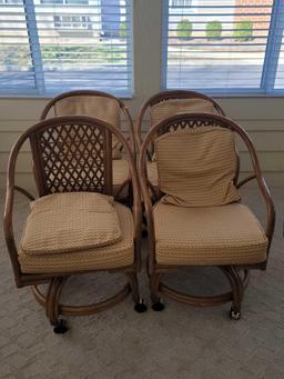 (SUNRM) SET OF 4 ROLLING WOODEN CHAIRS WITH WOVEN BACKS. YELLOW AND RED UPHOLSTERED SEAT AND BACK