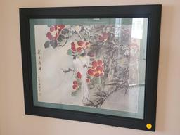 (LR) LOT OF 2 JAPANESE FRAMED FLORAL PRINTS. MATTED IN SAGE GREEN AND FRAMED IN A BLACK FRAME.