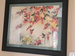 (LR) LOT OF 2 JAPANESE FRAMED FLORAL PRINTS. MATTED IN SAGE GREEN AND FRAMED IN A BLACK FRAME.