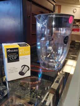 LOT OF 2 KEURIG ITEMS, GOURMET SINGLE CUP HOME BREWING REUSABLE FILTER, AND A 2 PINT PITCHER.