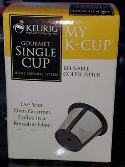 LOT OF 2 KEURIG ITEMS, GOURMET SINGLE CUP HOME BREWING REUSABLE FILTER, AND A 2 PINT PITCHER.