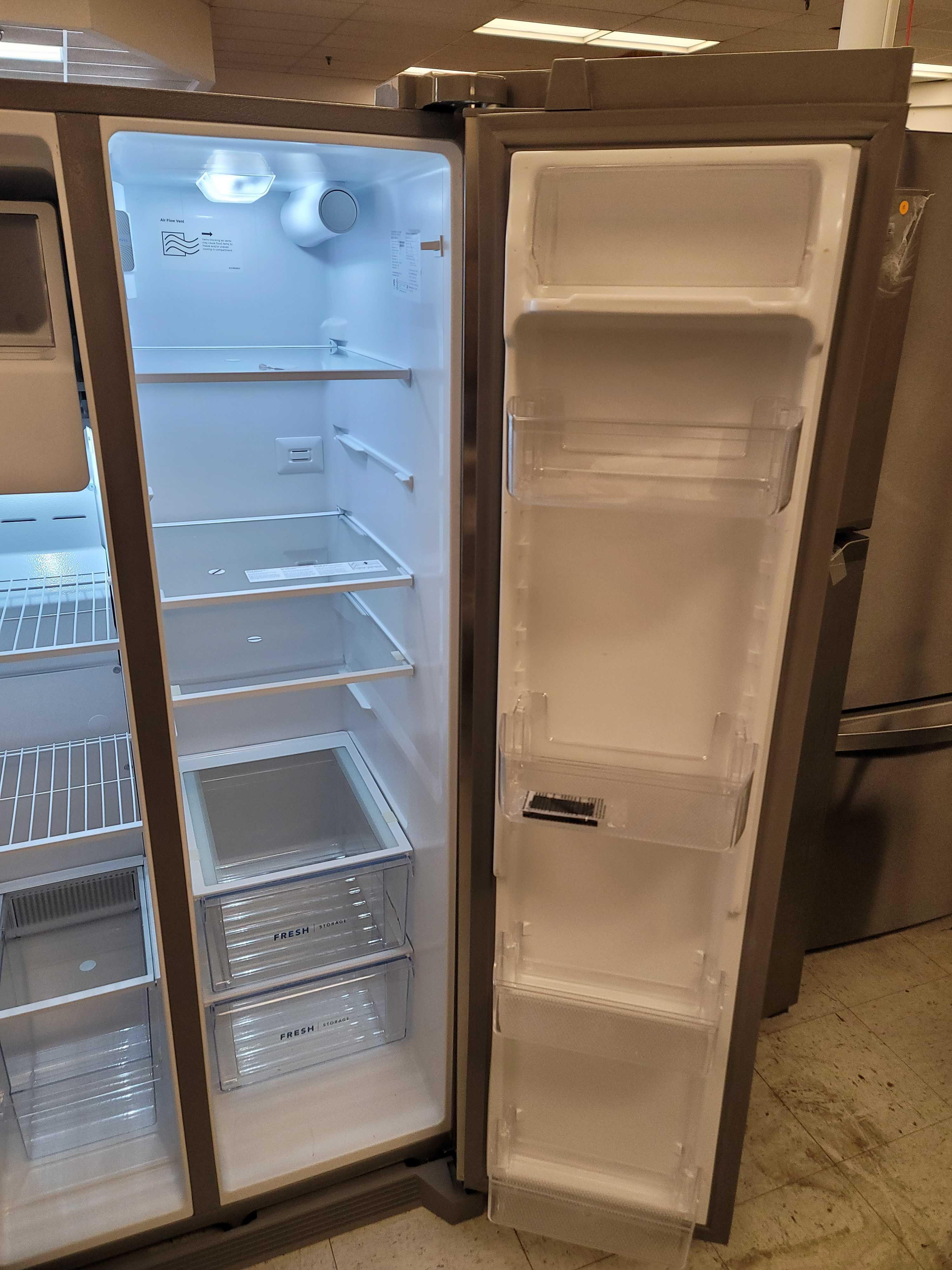 FRIGIDAIRE 33" 22.3 CU. FT. SIDE BY SIDE STAINLESS STEEL REFRIGERATOR WITH ICE MAKER. IT MEASURES