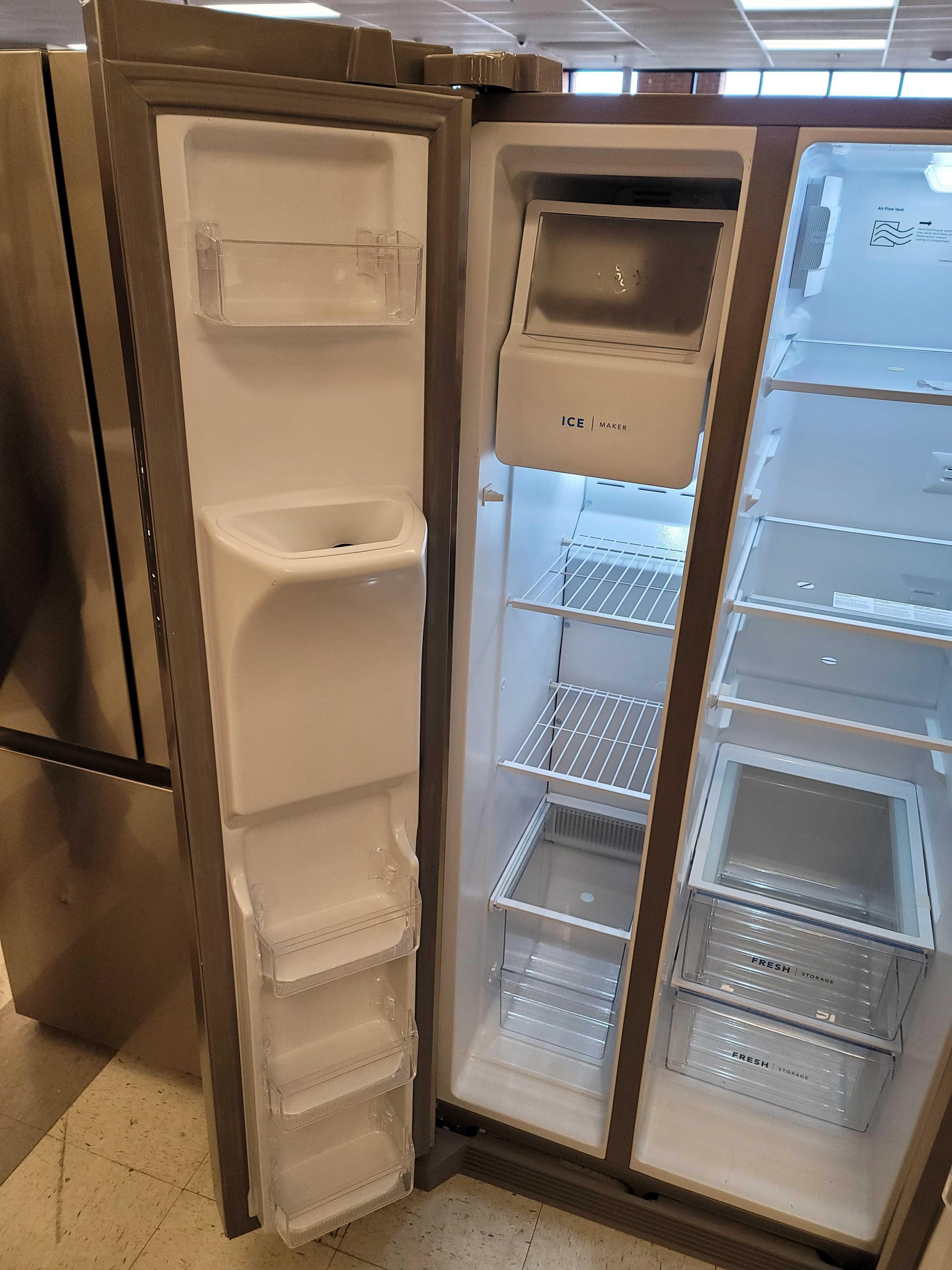 FRIGIDAIRE 33" 22.3 CU. FT. SIDE BY SIDE STAINLESS STEEL REFRIGERATOR WITH ICE MAKER. IT MEASURES