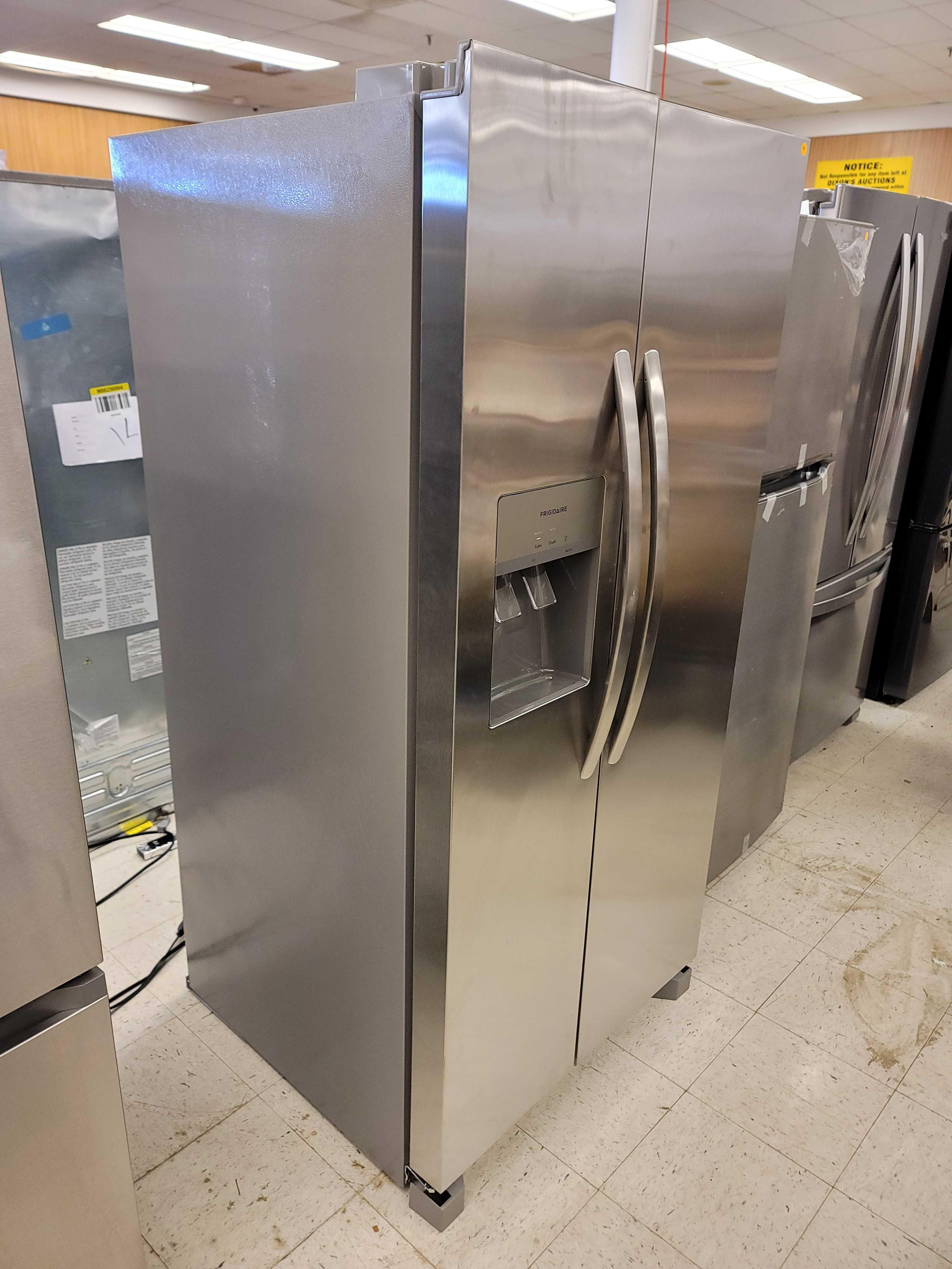 FRIGIDAIRE 33" 22.3 CU. FT. SIDE BY SIDE STAINLESS STEEL REFRIGERATOR WITH ICE MAKER. IT MEASURES