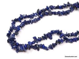 NATURAL MINED BLUE LAPIS STONE NECKLACE. IT MEASURES APPROX. 33" LONG.