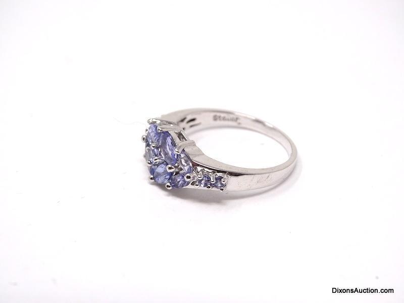 STAUER .925 STERLING SILVER & TANZANITE RING. FEATURES VARIOUS SIZED MARQUISE CUT TANZANITES IN A