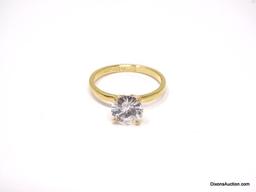 14KT H.G.E. YELLOW GOLD ENGAGEMENT RING WITH APPROX. 1 CT. PRONG SET CZ CENTER STONE. THE RING SIZE