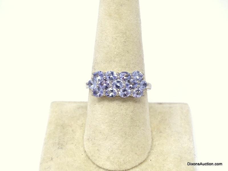 .925 AAA QUALITY UNHEATED OVAL CUT BLUE VIOLET AFRICAN TANZANITE RING. 14KT WHITE GOLD OVERLAY. SIZE