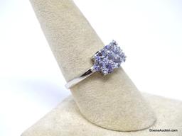 .925 AAA QUALITY UNHEATED OVAL CUT BLUE VIOLET AFRICAN TANZANITE RING. 14KT WHITE GOLD OVERLAY. SIZE