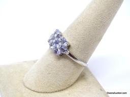 .925 AAA QUALITY UNHEATED OVAL CUT BLUE VIOLET AFRICAN TANZANITE RING. 14KT WHITE GOLD OVERLAY. SIZE