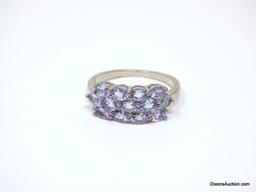 .925 AAA QUALITY UNHEATED OVAL CUT BLUE VIOLET AFRICAN TANZANITE RING. 14KT WHITE GOLD OVERLAY. SIZE