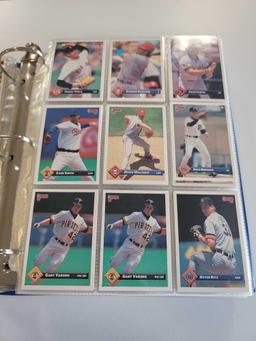 BLUE BINDER FULL OF ASSORTED BASEBALL CARDS. 791 CARDS. INCLUDES PLAYERS SUCH AS: CRAIG LEFFERTS,