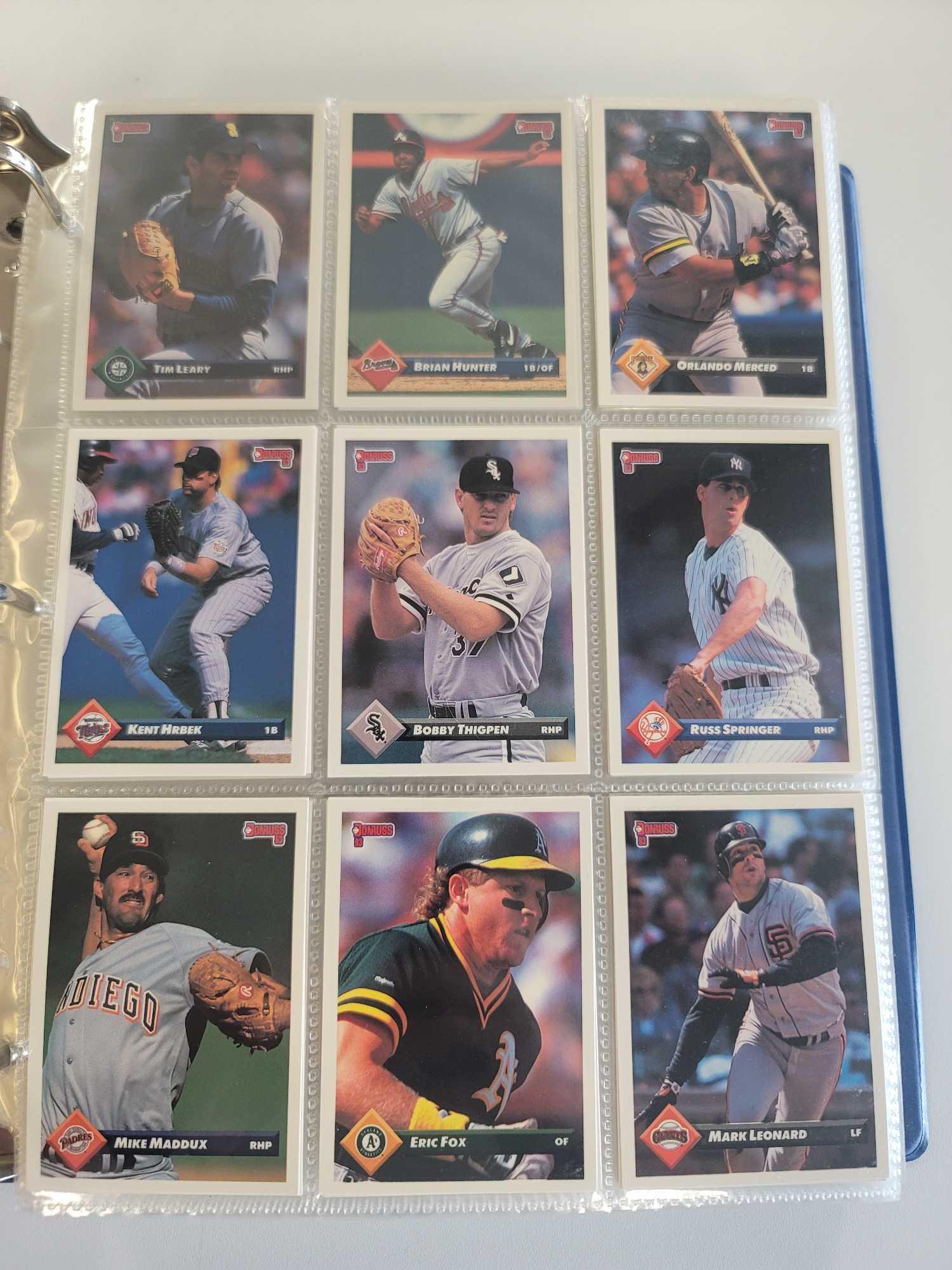 BLUE BINDER FULL OF ASSORTED BASEBALL CARDS. 791 CARDS. INCLUDES PLAYERS SUCH AS: CRAIG LEFFERTS,