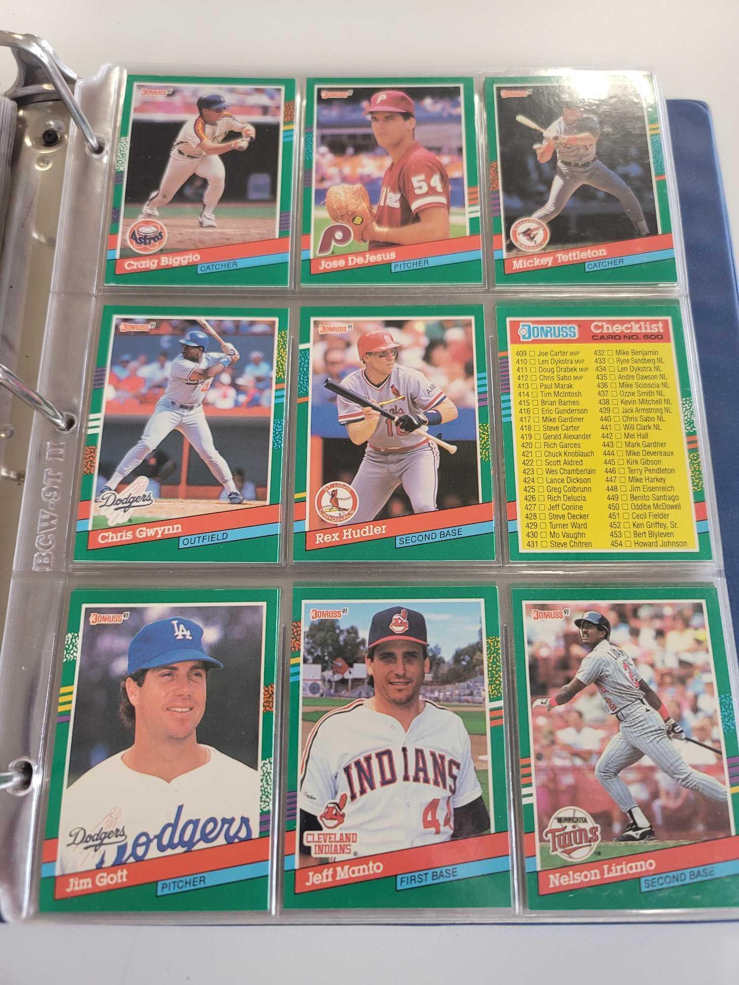 BLUE BASEBALL CARD ALBUM BINDER FILLED WITH ASSORTED BASEBALL CARDS. INCLUDES PLAYERS SUCH AS: DAVE