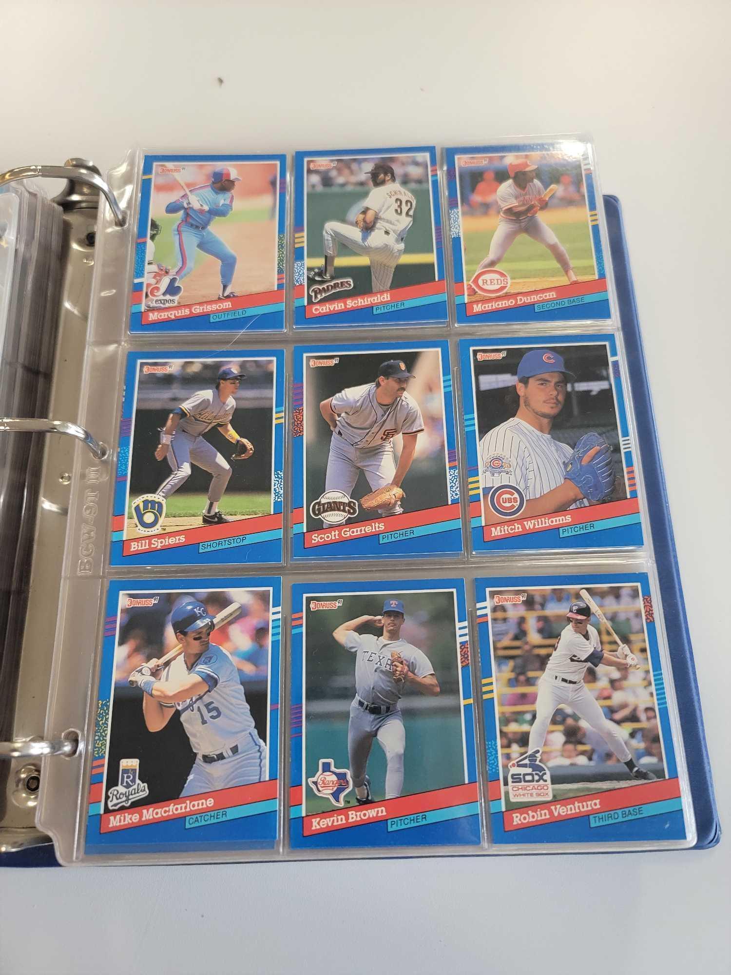 BLUE BASEBALL CARD ALBUM BINDER FILLED WITH ASSORTED BASEBALL CARDS. INCLUDES PLAYERS SUCH AS: DAVE