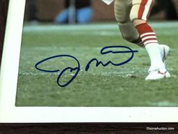 FRAMED & AUTOGRAPHED PHOTO OF JOE MONTANA. DISPLAYED IN A BROWN FRAME. IT MEASURES APPROX. 9-1/2" X