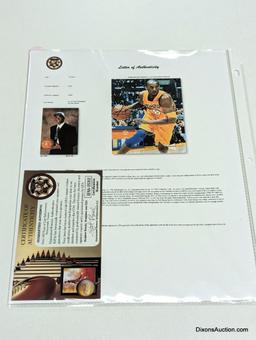UNFRAMED & AUTOGRAPHED PHOTO OF KOBE BRYANT. COMES WITH A PLASTIC PROTECTIVE SLEEVE. IT MEASURES