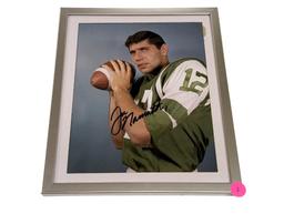 FRAMED & AUTOGRAPHED PHOTO OF JOE NAMATH. DISPLAYED IN A SILVER FRAME. IT MEASURES APPROX. 9-1/2" X