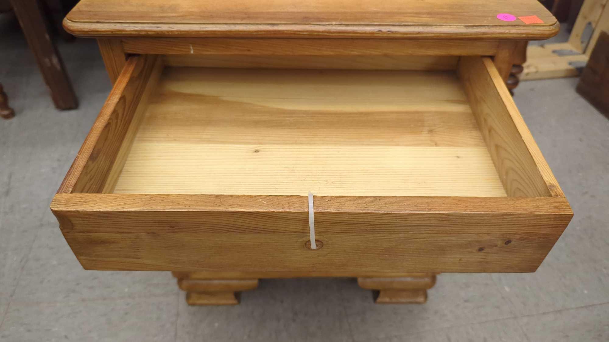 WOODEN SIDE TABLE ONE DRAWER OVER ONE DOOR, MEASURES APPROXIMATELY 20 IN X 14 IN X 22 IN, DRAWER IS