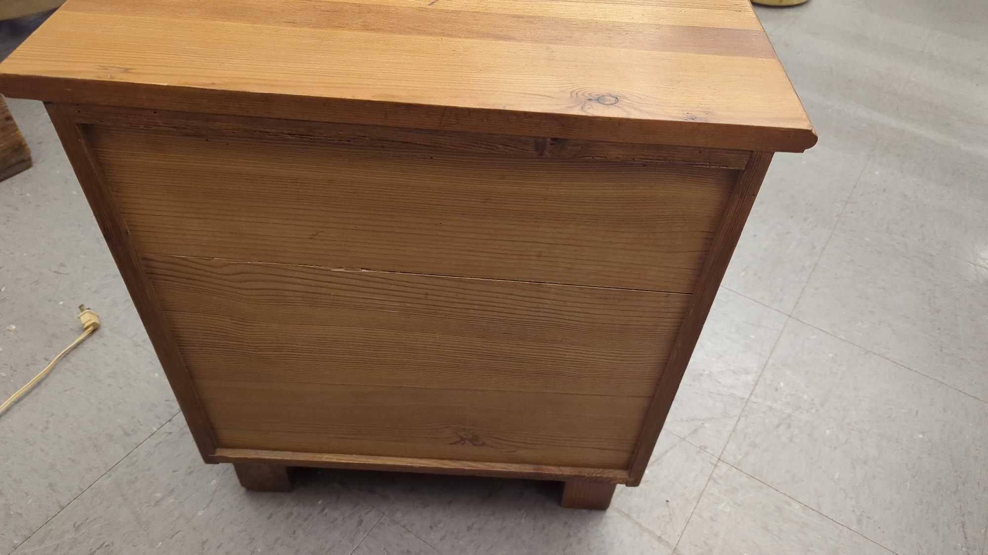 WOODEN SIDE TABLE ONE DRAWER OVER ONE DOOR, MEASURES APPROXIMATELY 20 IN X 14 IN X 22 IN, DRAWER IS