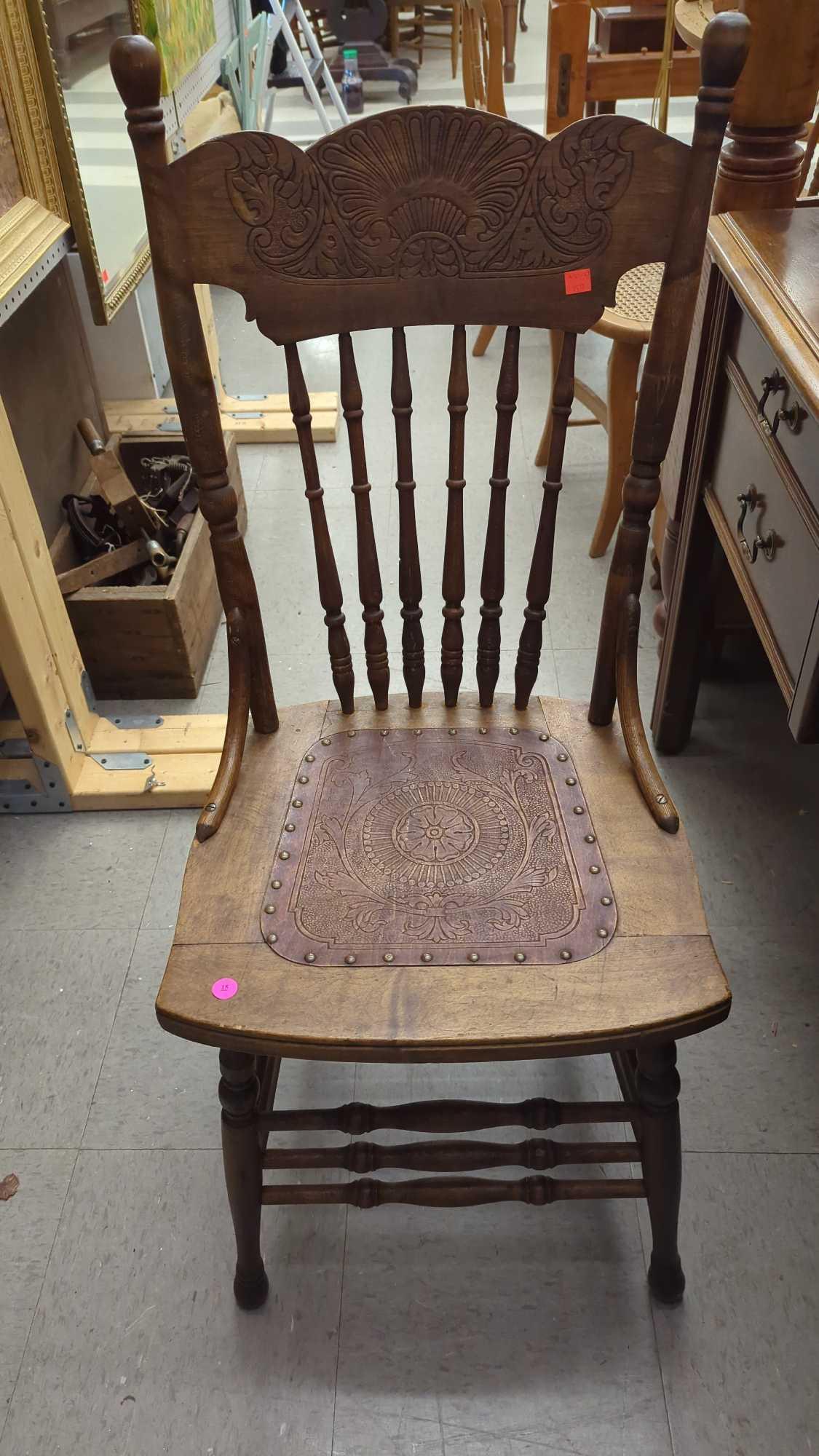 EARLY STYLE WOODEN PRESS BACK DINING CHAIR WITH A PRESS BOTTOM, BOTTOM HAS NAIL HEAD TRIM AROUND