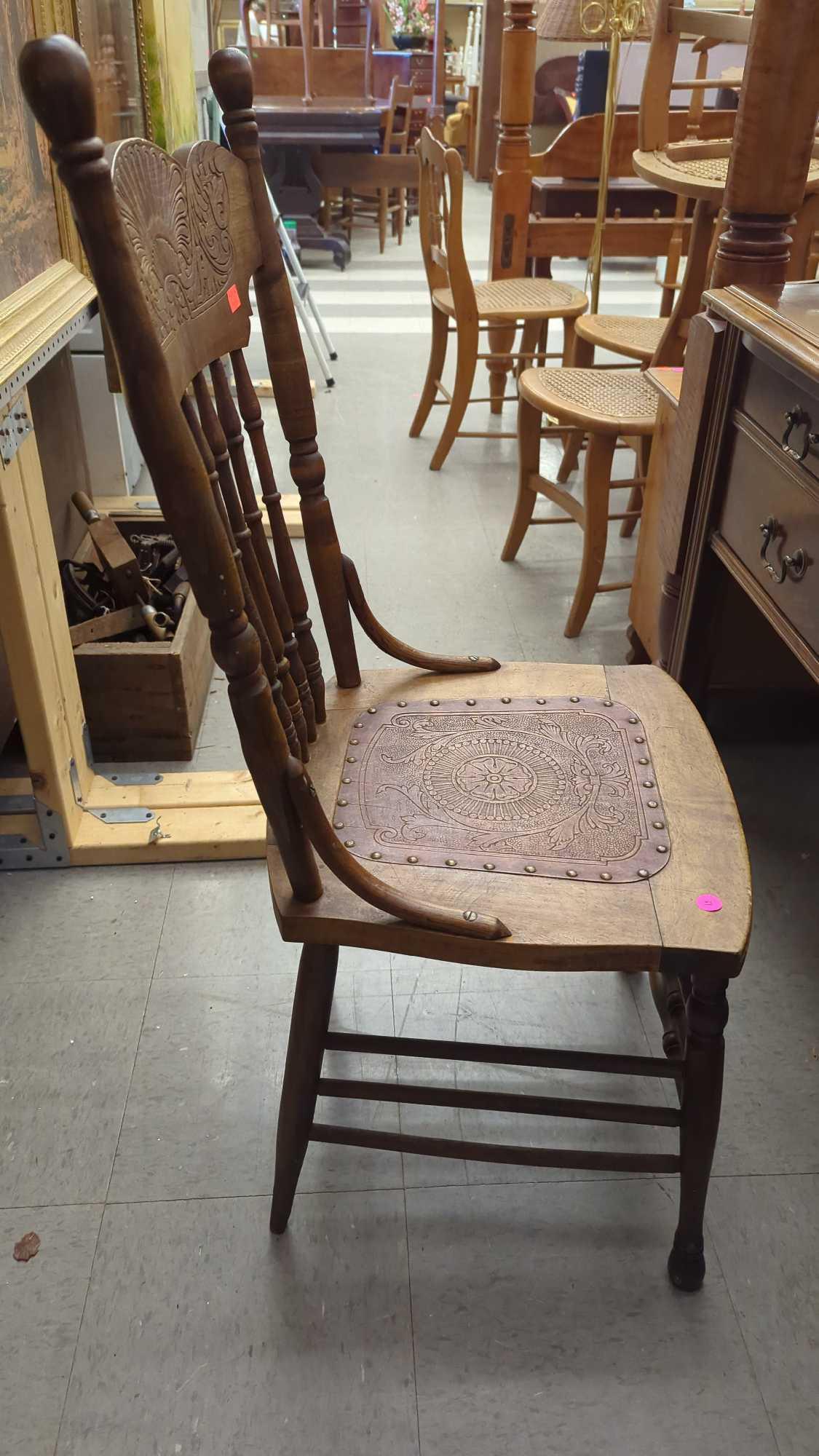 EARLY STYLE WOODEN PRESS BACK DINING CHAIR WITH A PRESS BOTTOM, BOTTOM HAS NAIL HEAD TRIM AROUND