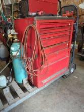 (WS) RED METAL TOOLBOX WITH ATTACHED CART. TOOLBOX HAS EIGHT DRAWERS ONE HAS A SLIDE LOCK. CART IS