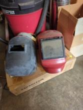 (WS) BOX LOT OF ASSORTED ITEMS TO INCLUDE SP RED WELDING HELMET AND A BLACK WELDING FACE SHIELD.