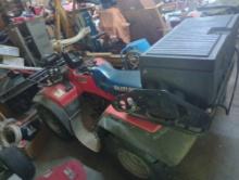 Suzuki Quad runner. 4wd. Appears to have 9,025 miles. Red in color. Comes with black hard plastic