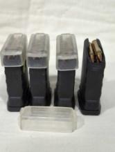 LOT OF (4) ROLLERMAG PRO MAG RM-10 MAGAZINES, EACH FULL OF 10 .223 ROUNDS. COME WITH RUBBER CAPS.