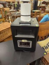 Lot of three items including 1 Soleil Home Heater on Wheels, 1 Soleil Remote controller for Heater,