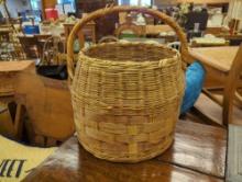Light brown colored woven basket with handle Slight Wear and Tear to Basket (Pictures Included)
