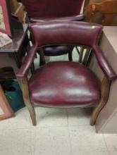 Deep Red Arm Chair with Cushioned Back, Arm Rest and Seat with Wooden Base Slight Tear on Back side