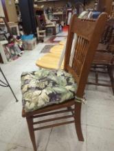 Medium Brown Colored Chair with Sideways Ladder Back and Woven Seats with Grape Themed Cushion