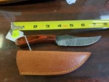 HANDMADE DAMASCUS STEEL PERSIAN POINT KNIFE WITH ORANGE AND BROWN HANDLE. BLADE MEASURES 4". COMES