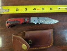 HANDMADE DAMASCUS DROP POINT FOLDING KNIFE WITH MULTI COLORED HANDLE. BLADE MEASURES 3". COMES WITH