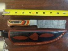 HANDMADE DAMASCUS SHEEPSFOOT BLADE KNIFE WITH MULTI COLORED HANDLE. BLADE MEASURES 4.5". COMES WITH