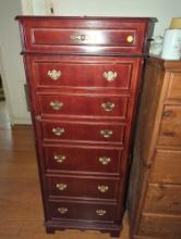 (BR3) CHERRY COLORED WOODEN JEWELRY ARMOIRE WITH MIRRORED LIFT TOP, AND FRONT CABINET DOOR THAT